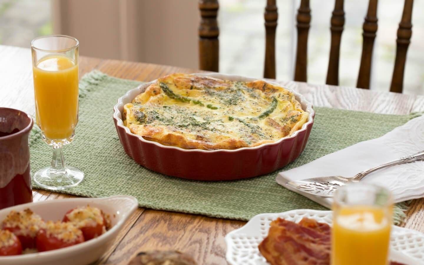 Breakfast quiche with fresh orange juice Breakfast quiche with fresh orange juice