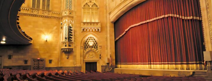 interior of hershey theatre with seats and red curtain