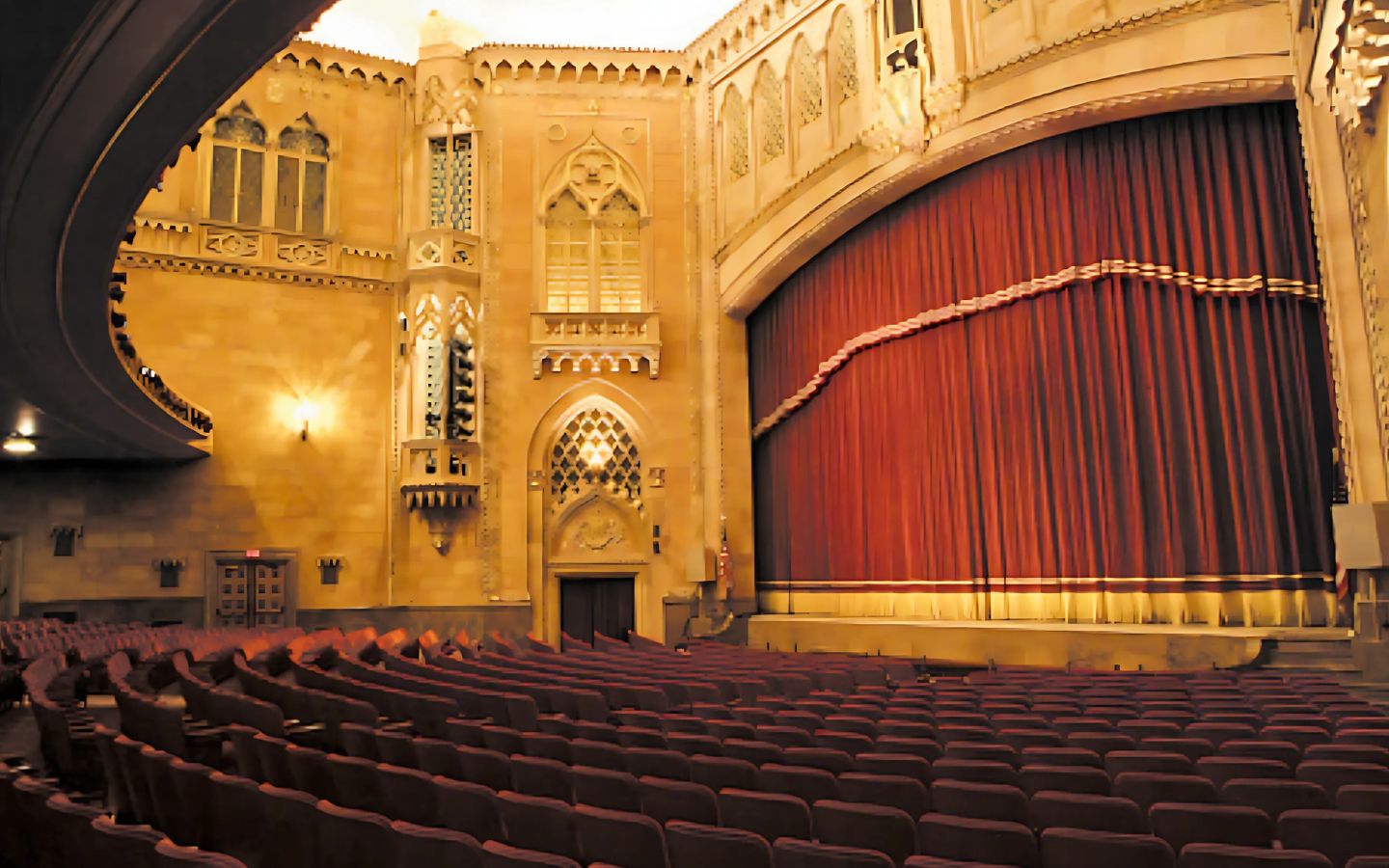 interior of hershey theatre with seats and red curtain