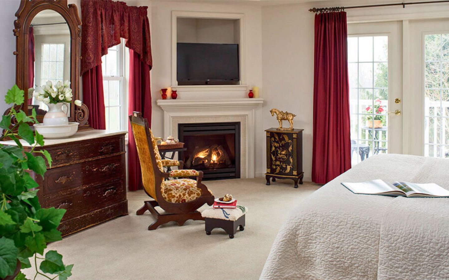 westwynd suite with fireplace and sitting area